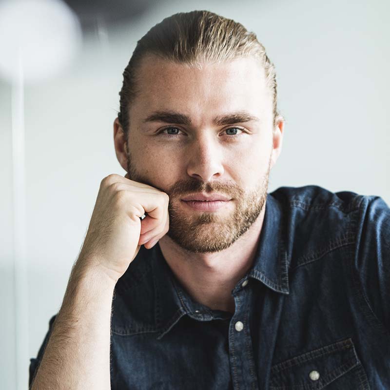 Portrait Of Confident Casual Businessman At Desk I T68eule.jpg